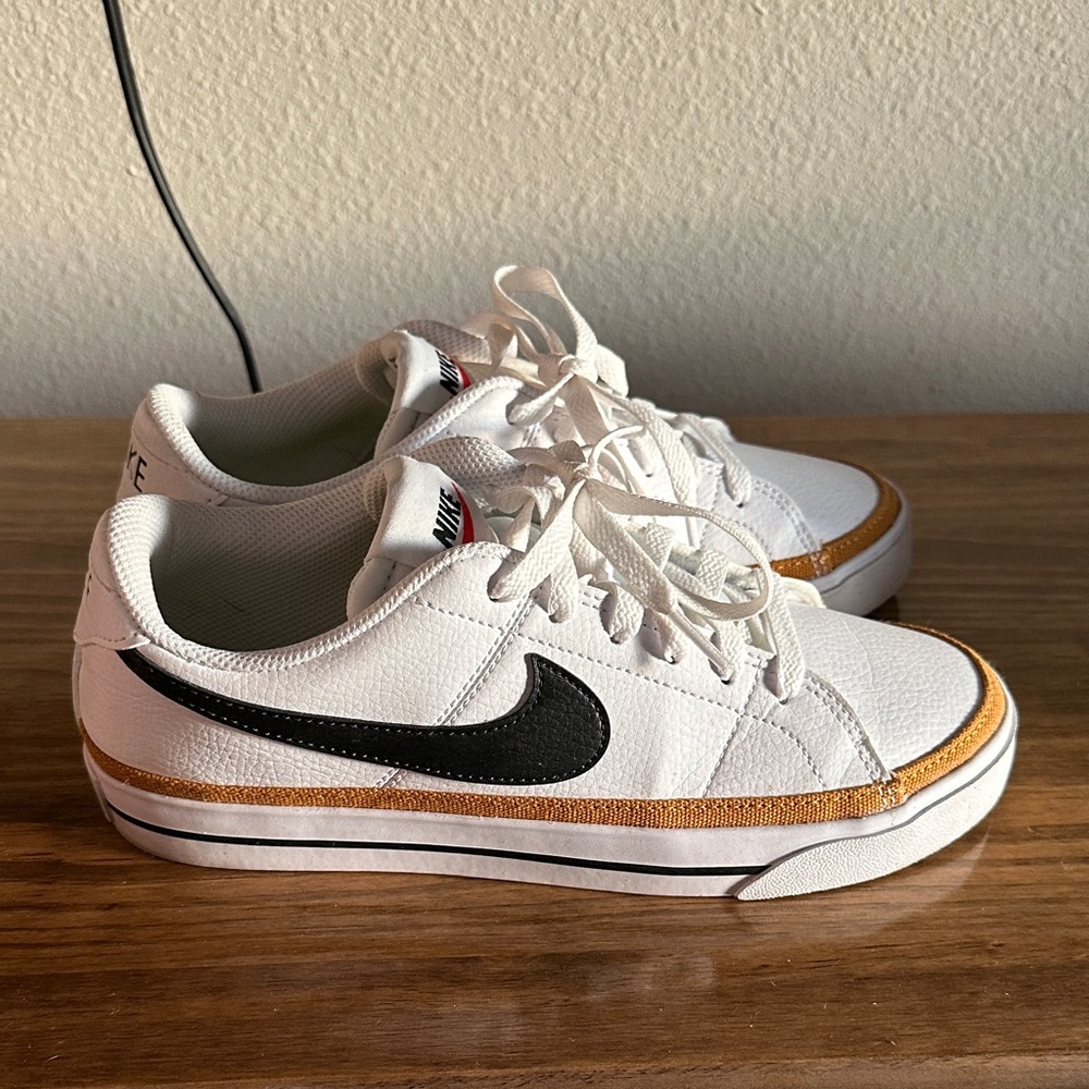 Nike White Sneakers with Gold Trim